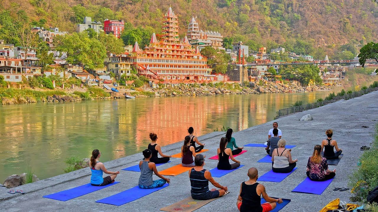 Yoga on the bank of the Ganges in Rishikesh